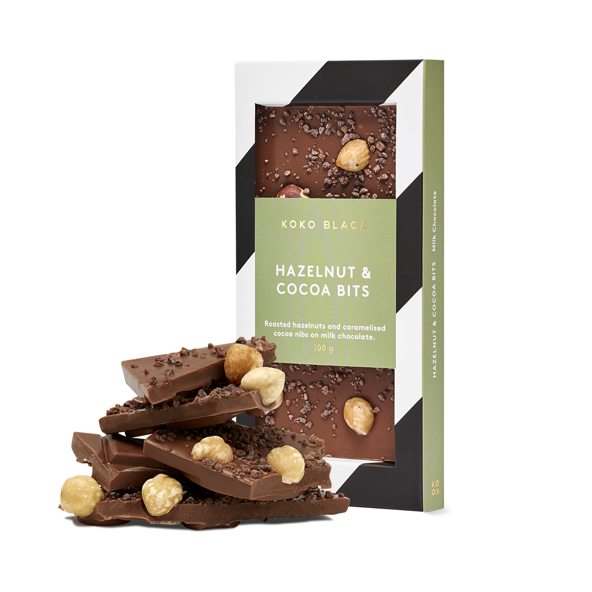 Broken chocolate pieces in front of chocolate block